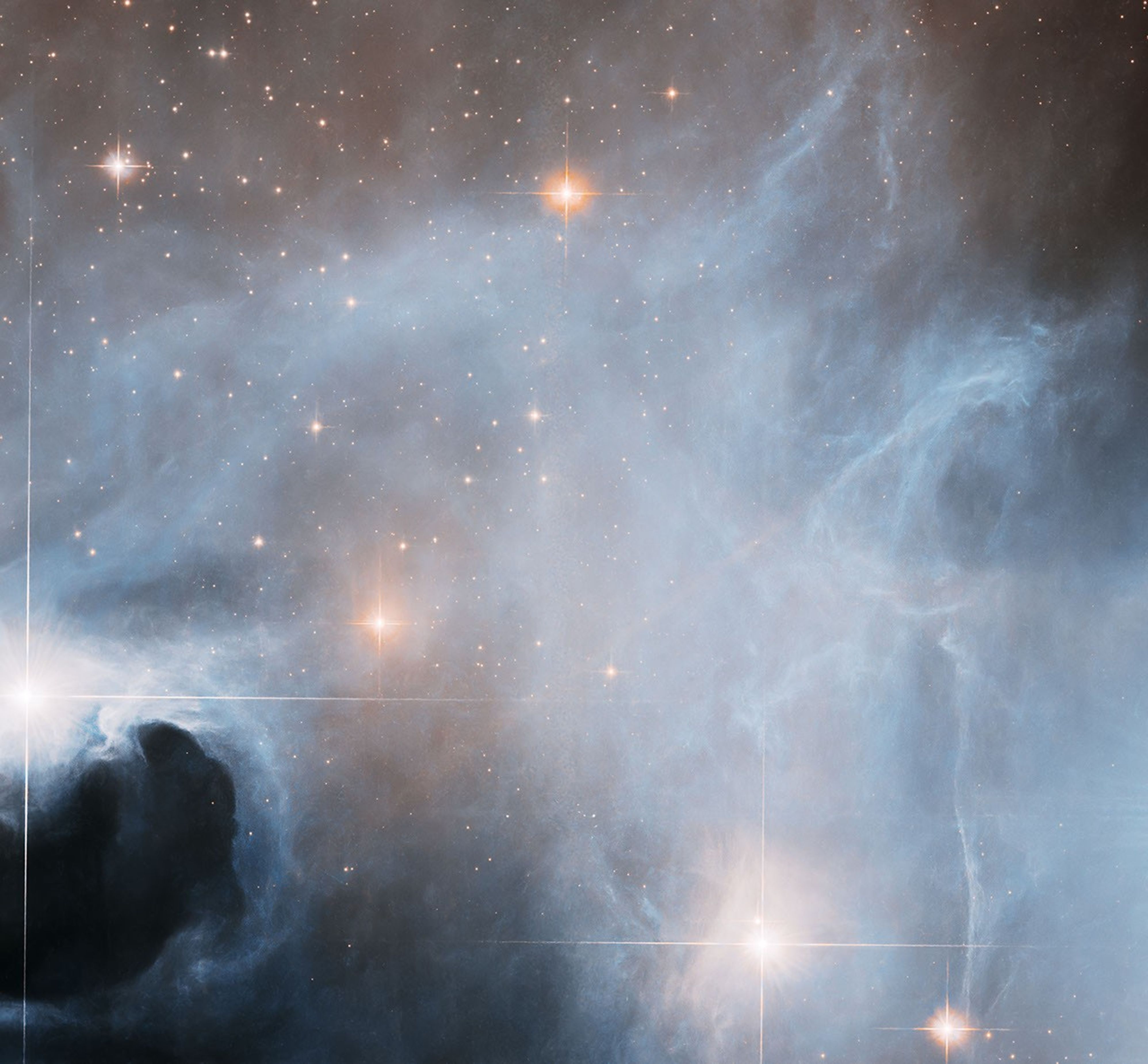 Hubble Observes Ghostly Cloud Alive with Star Formation