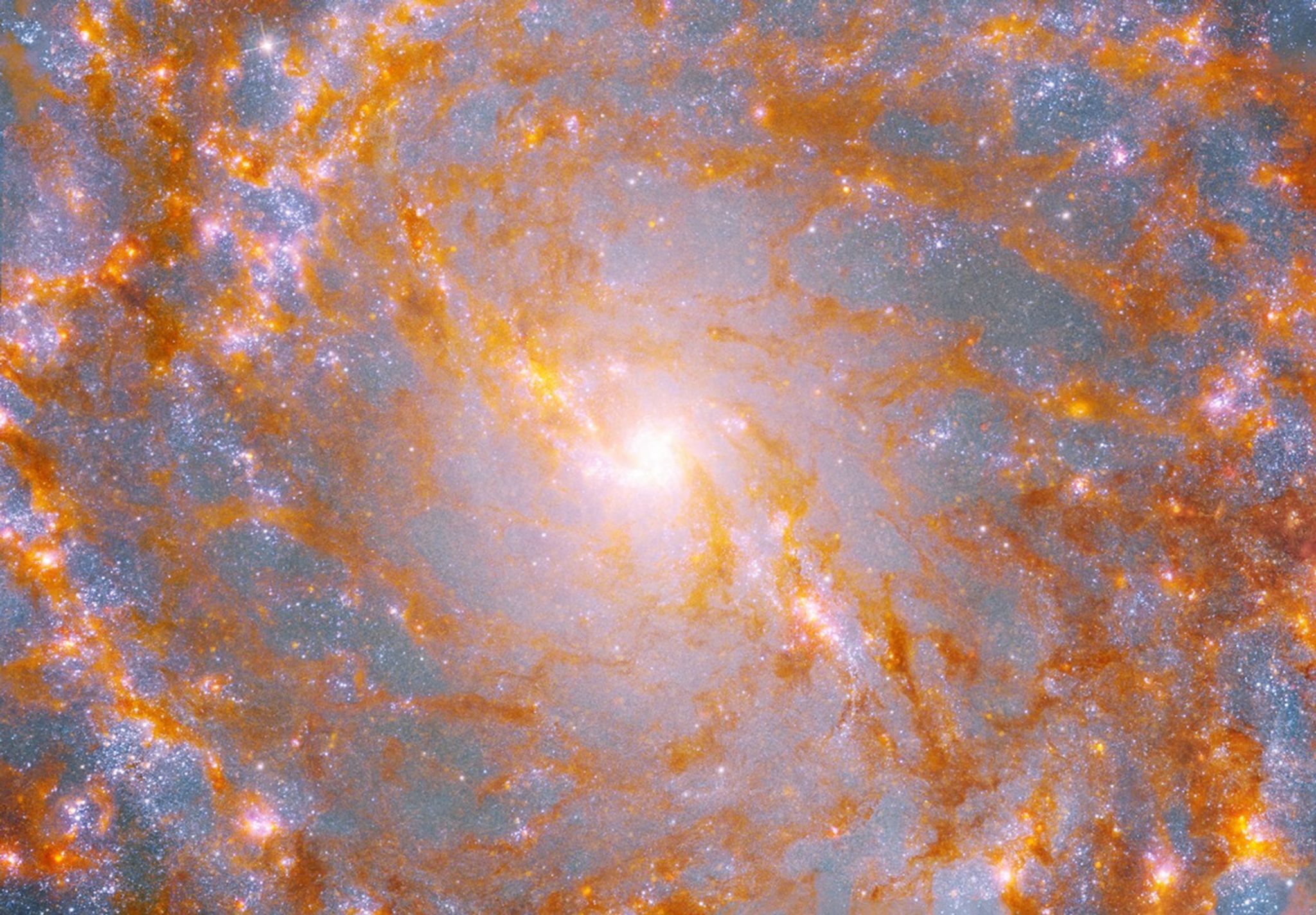 NASA’s Hubble, Webb Telescopes Survey Pinwheel Galaxy